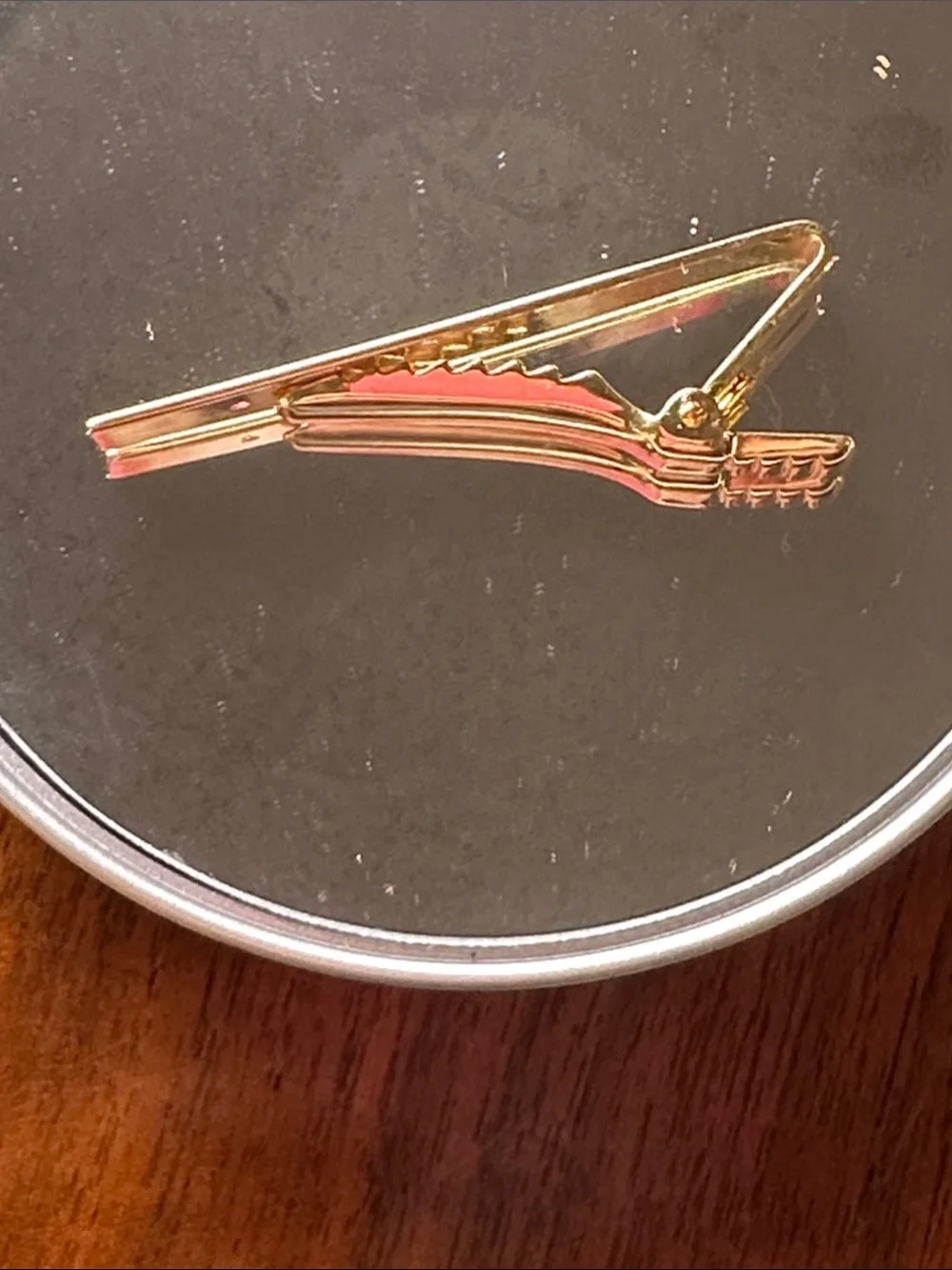 Vintage Anson Gold-Tone Star Accent Tie Clip with Red Stone